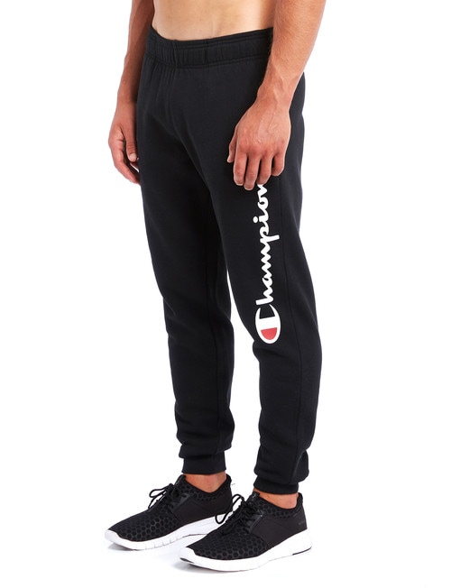 Champion tracksuit bottoms with logo taping  ASOS
